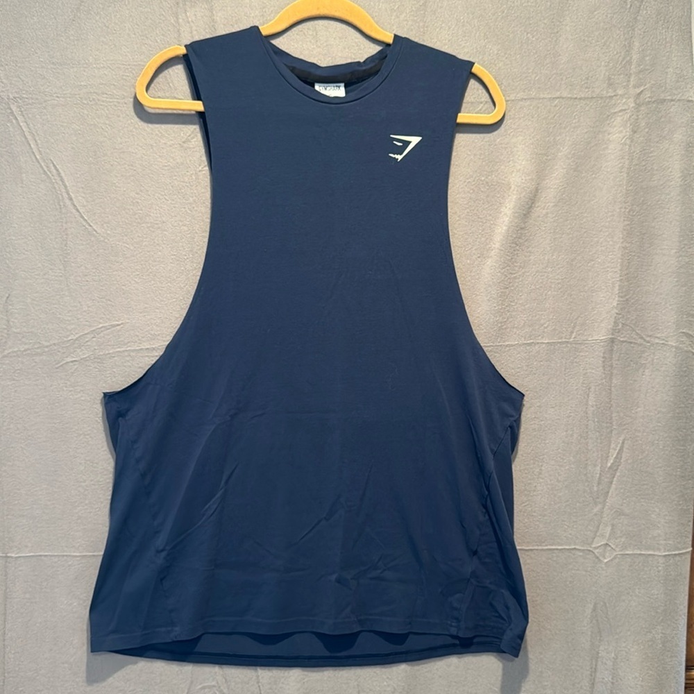 Gym shark tank top with side slits at bottom